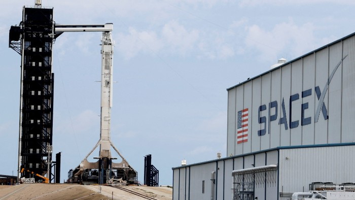 A SpaceX Falcon 9 rocket prepares for launch at the Kennedy Space Center in Cape Canaveral, Florida, US